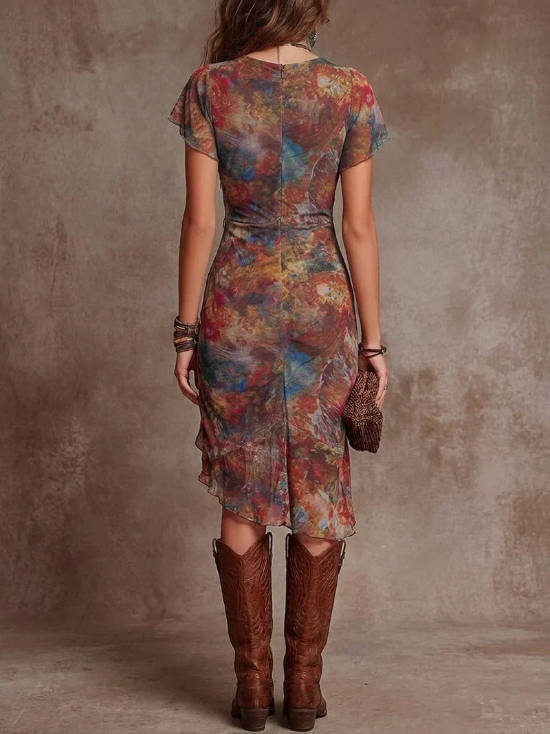 Salomé Vestido Midi Plisado con Escote en V y Estampado Bohemio Abstracto