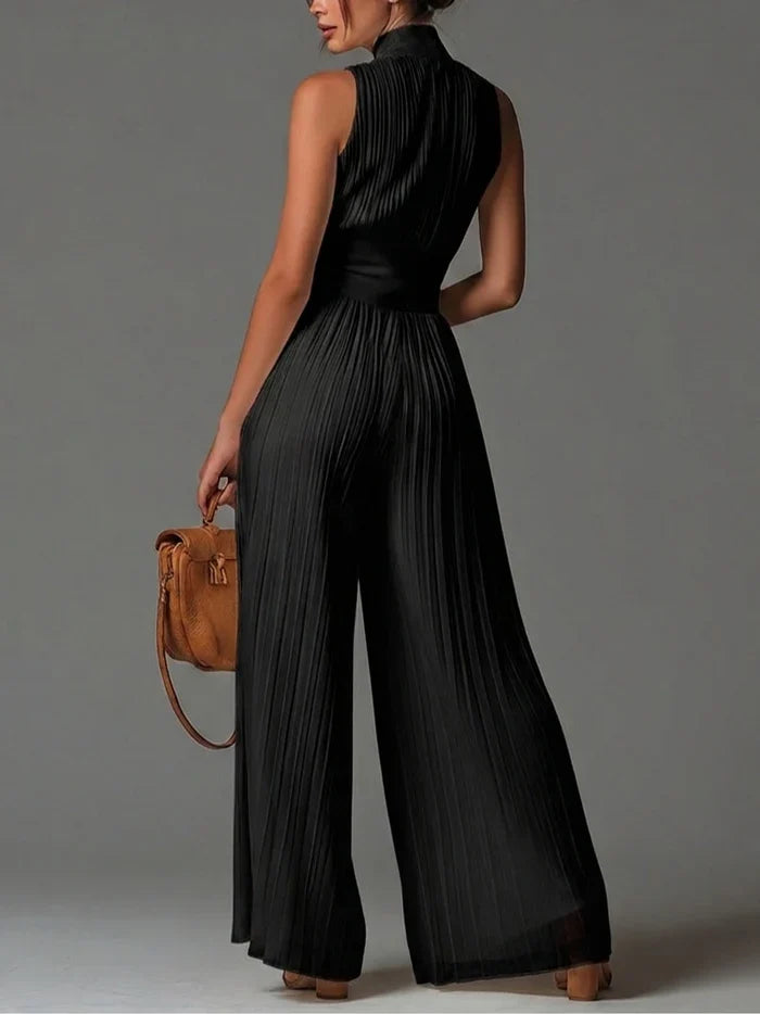 Mercedes Mono Negro sin Mangas de Chiffon con Escote en V, Pliegues, Cremallera y Pernera Ancha