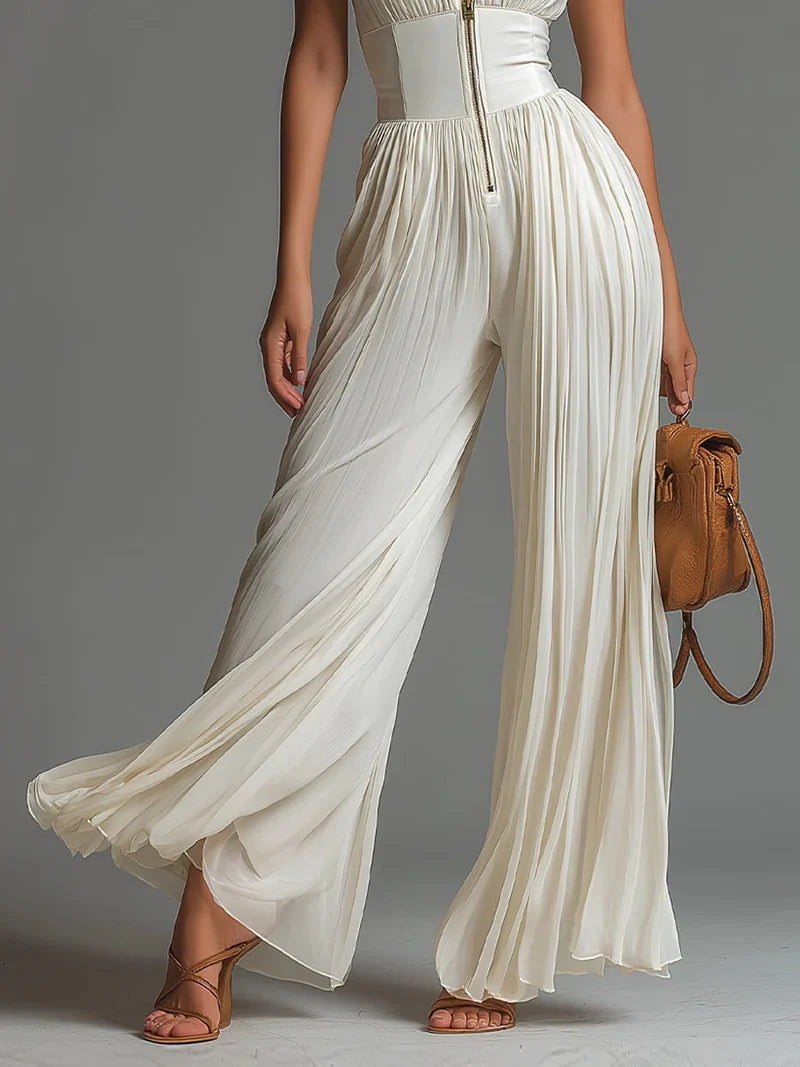 Olivia Mono Blanco de Chiffon sin Mangas con Cremallera, Pliegues y Pernera Ancha